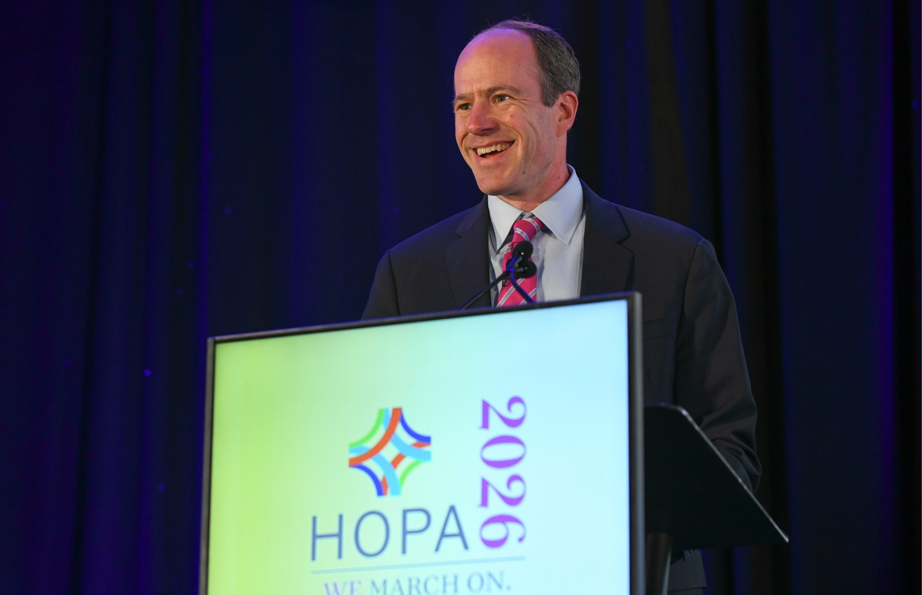 A speaker at HOPA 2026