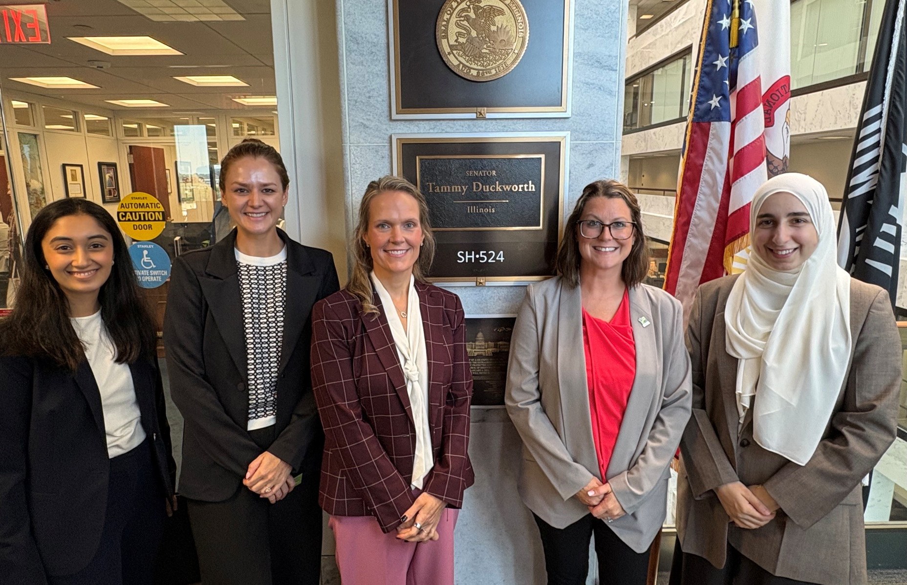 HOPA advocates standing outside Sen. Duckworth's office