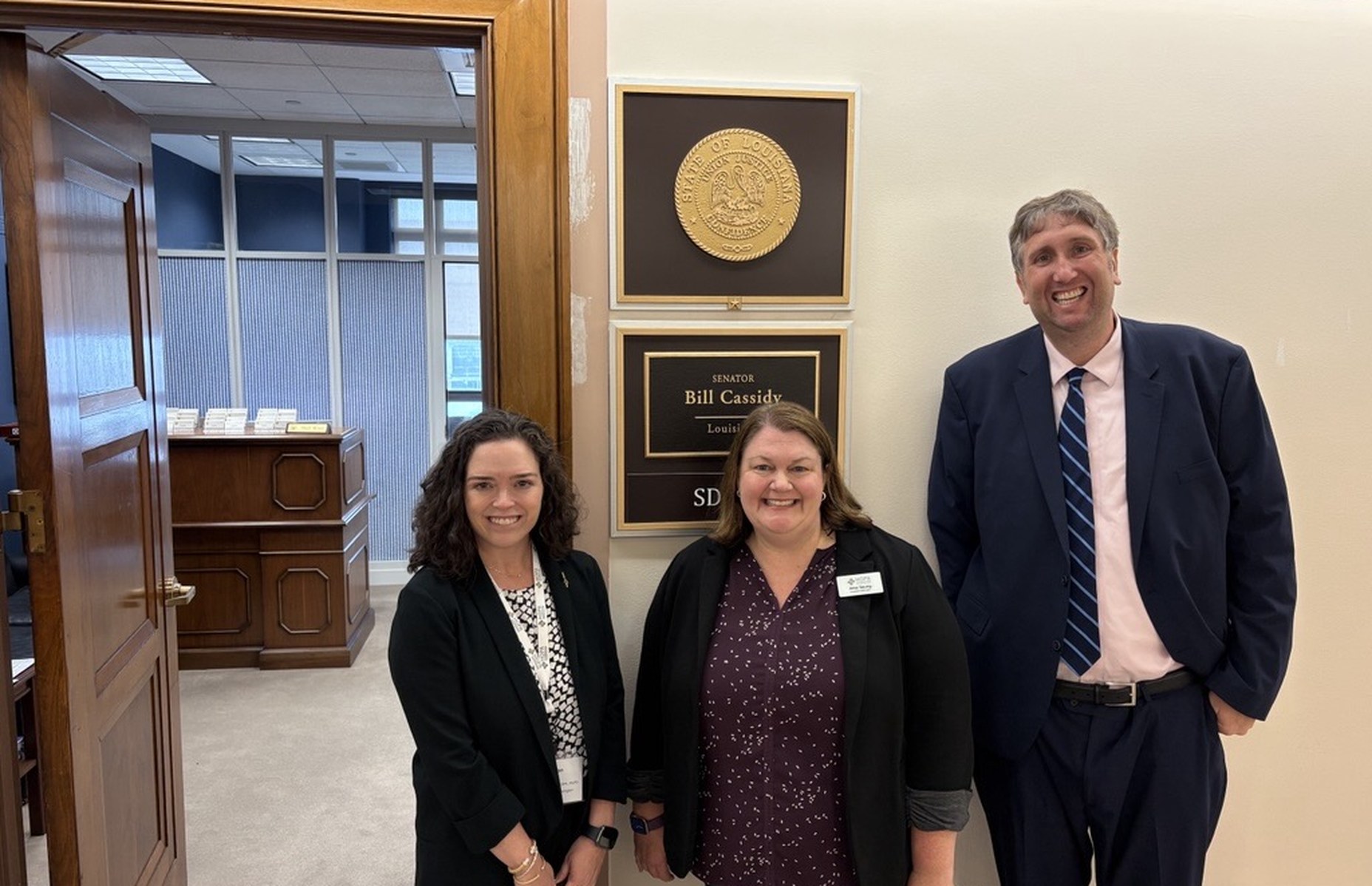 HOPA members and a staffer outside Sen. Cassidy's office