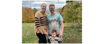 A photo of Aimee Merkert and her family in nature