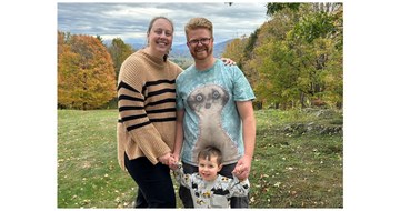 A photo of Aimee Merkert and her family in nature