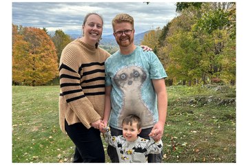 A photo of Aimee Merkert and her family in nature