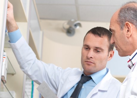 Pharmacists talking and looking serious