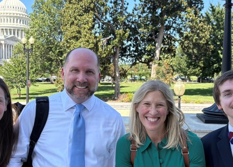 A photo of several HOPA members posing in front of the Capitol