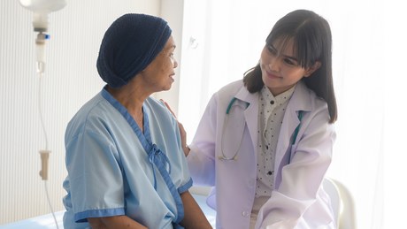 A patient and pharmacist talking