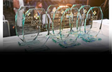 A photo of the HOPA Member Awards on a table