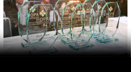 A photo of the HOPA Member Awards on a table