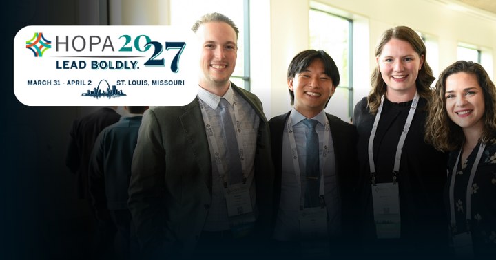 A group of attendees at Annual Conference with the HOPA 2027 logo